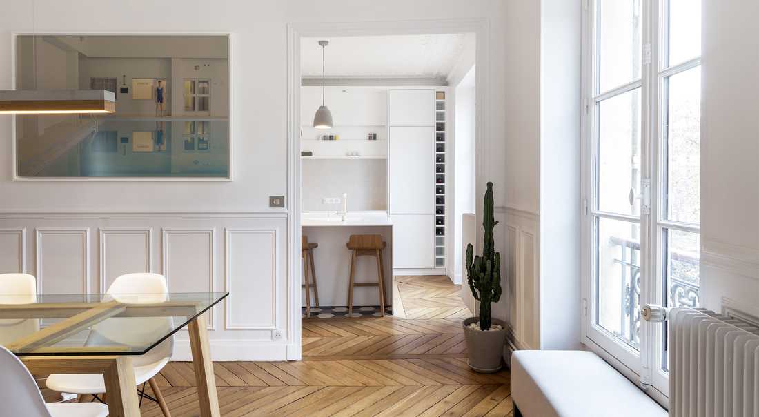Aménagement d'un cuisine ouverte dans un salon par un architecte à Nîmes