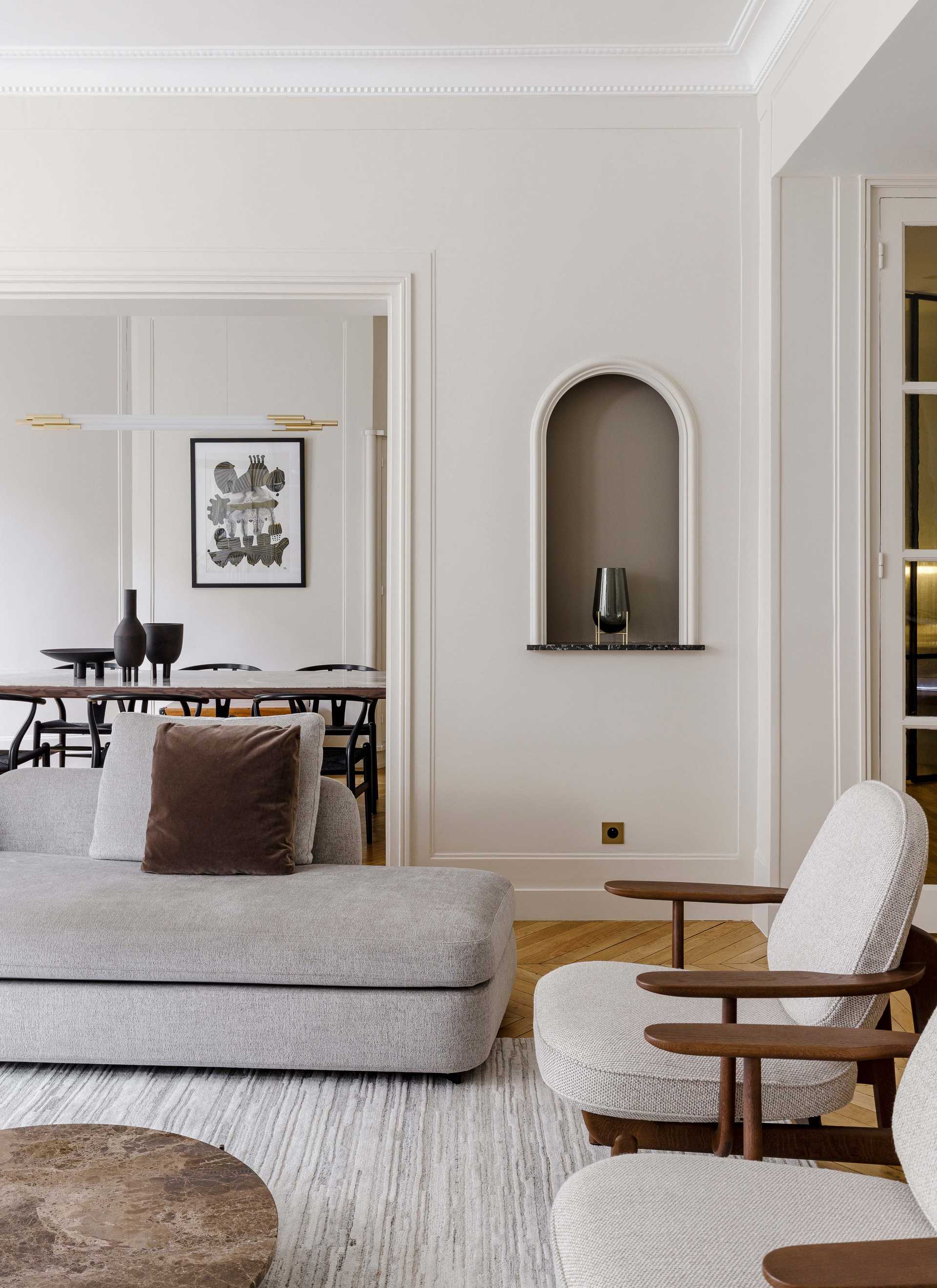 An interior designer decorates the living room of an old apartment in Nîmes