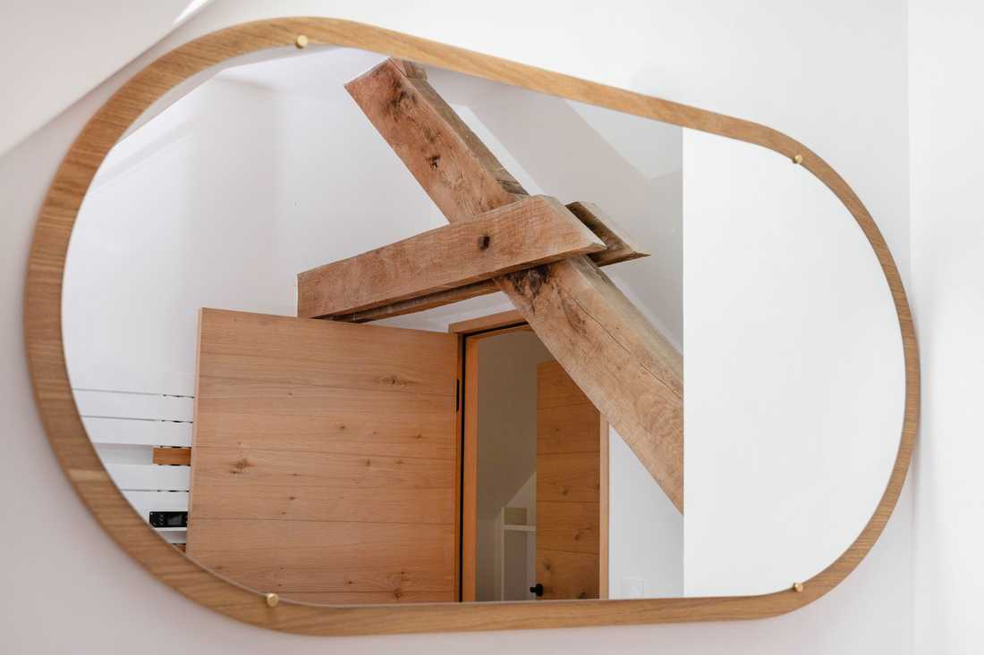 Rénovation d'une maison en pierre avec des poutres apparentes